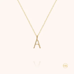 Collier Capital Initiale - or jaune 750/1000